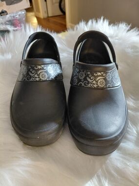 Crocs Women's Black Slip-On Clogs with Floral Accent